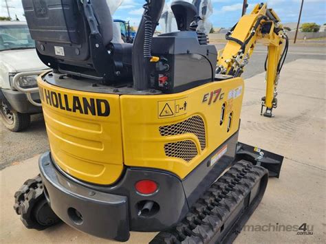 new holland blue mini excavator|new holland mini excavator specs.